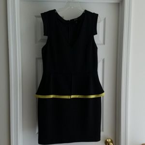 Peplum dress with deep v neck and yellow trim